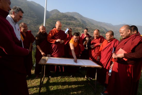 Buddhist monks engage in science experiments in Bhutan. Photo by Bryce Johnson