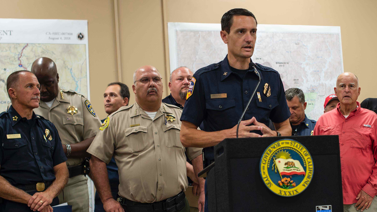 Fire Chief Jonathan Cox speaking at a press conference with Governor Brown regarding the Carr Fire in July 2018