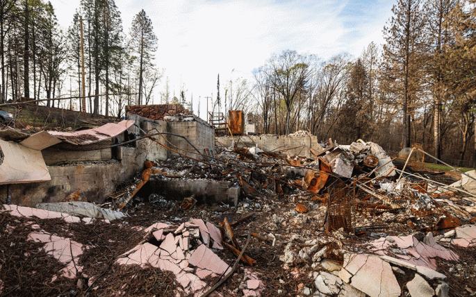 A loop of images of Cal Poly students surveying a destroyed property in Paradise, CA.