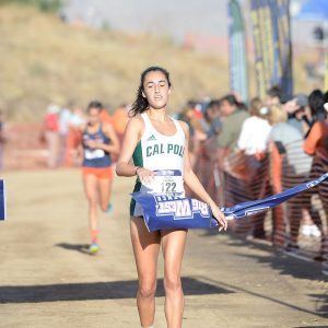 Cal Poly women's cross country athlete Miranda Daschian crosses the finish line first at the Big West championship