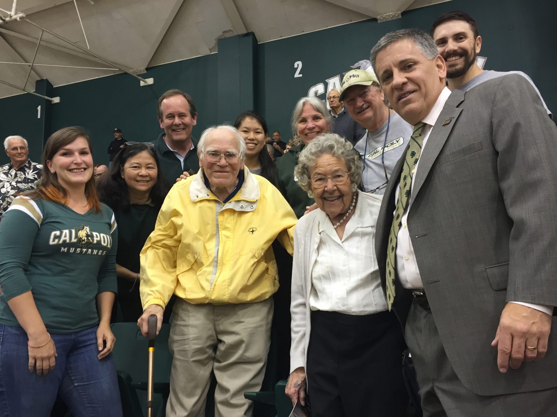 Cal Poly's President Armstrong smiles with Everett Chandler and several family members