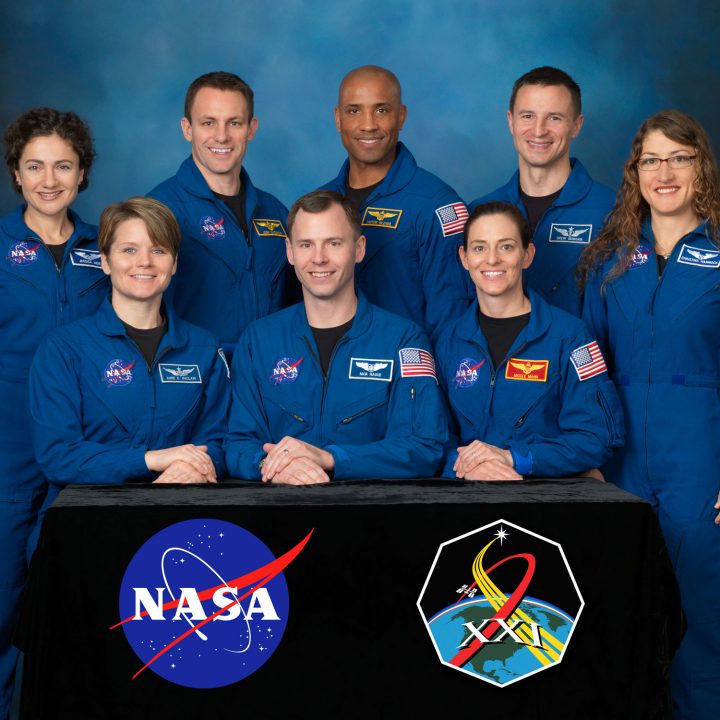 Seven people smile in blue flight suits as NASA's 21st class of astronauts