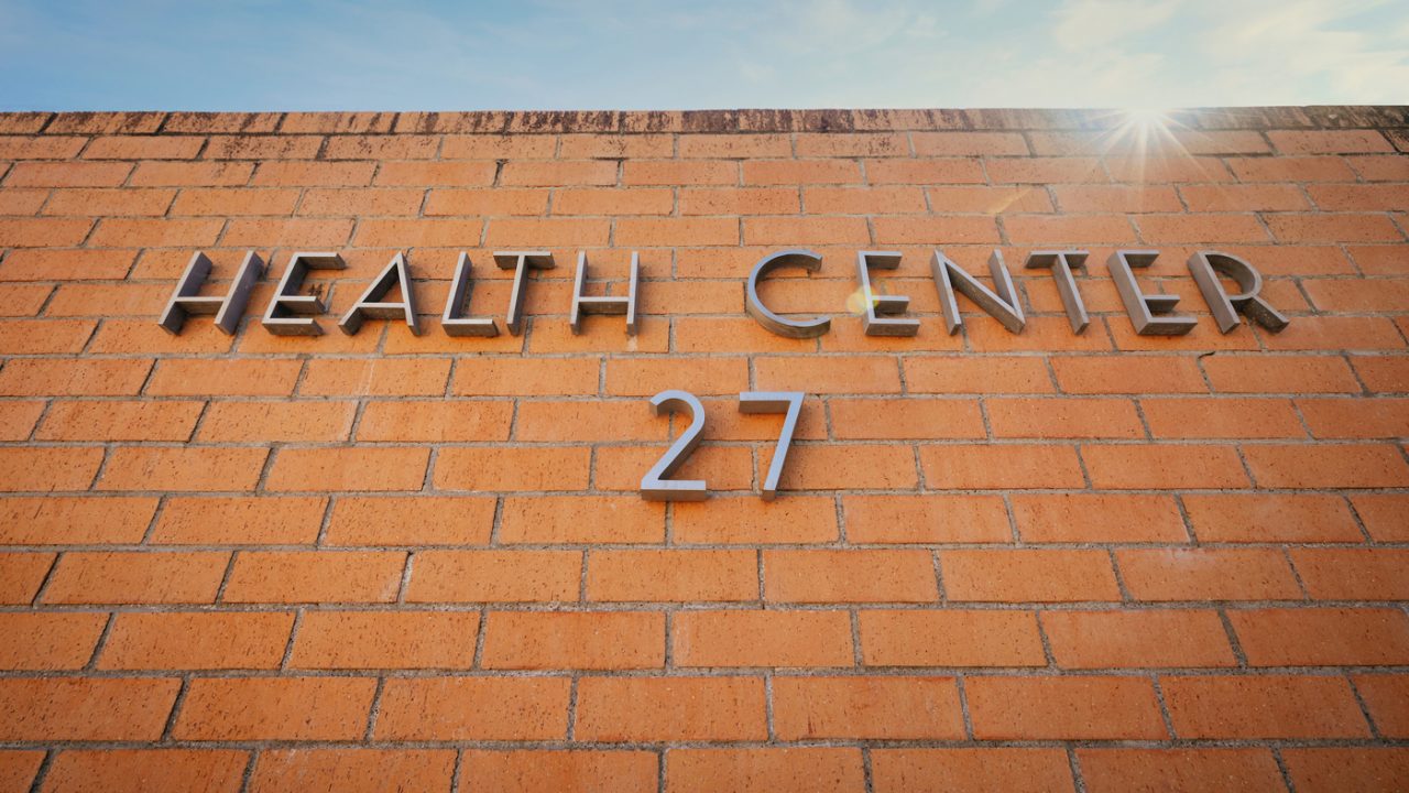 A brick wall with the sign 'Health Center 27'