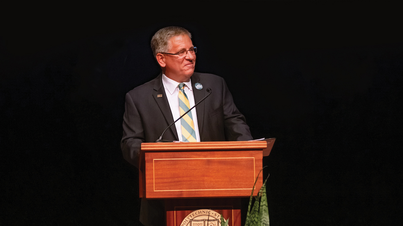 President Jeffrey Armstrong speaks at the podium at Fall Convocation 2021