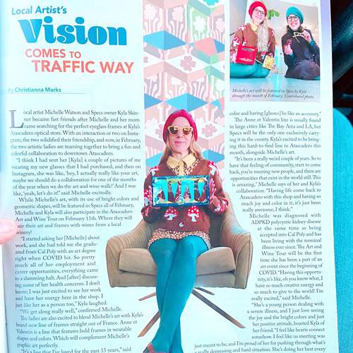 A photo of a publication article titled 'Local Artist's Vision Comes to Traffic Way'