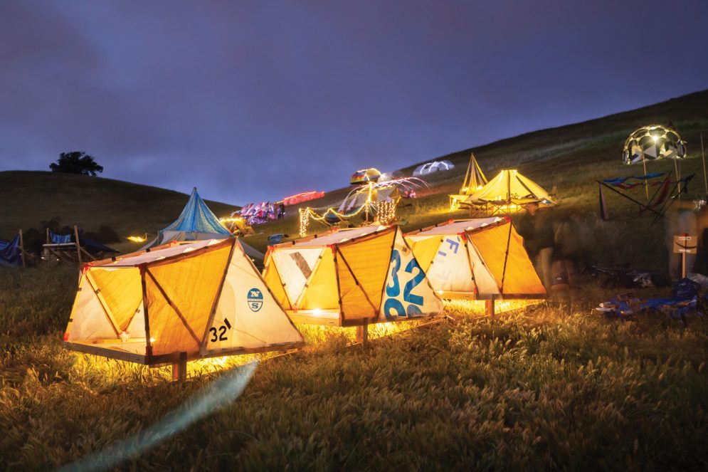 Experimental structures are lit up at night in Poly Canyon