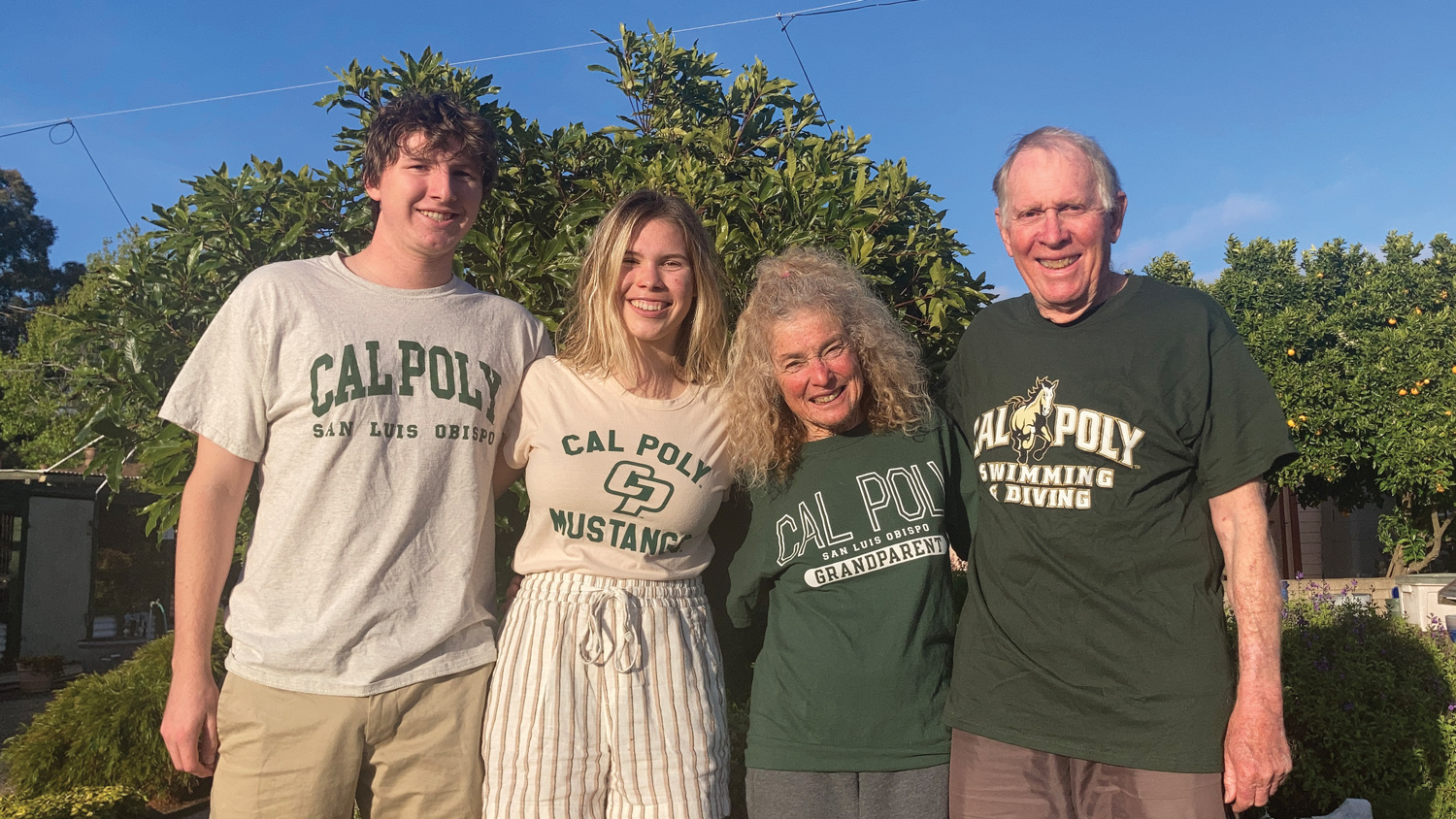 Sally and Jack Adam stand with their grand children Sierra and Zac