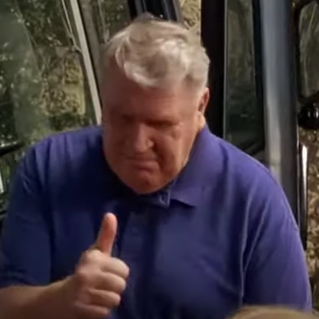 A screenshot of John Madden giving thumbs up in the film Little Giants
