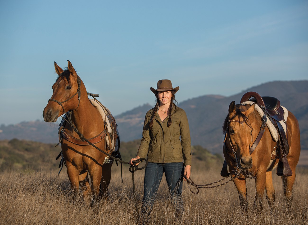 Gillian with her horses, Takoda and Shyla, in 2019