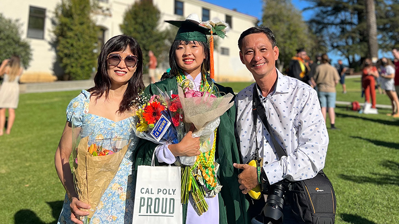 A graduate and her parents