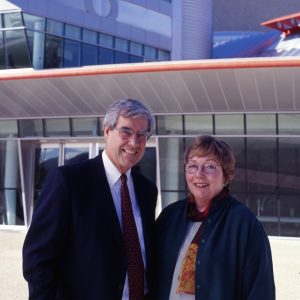 Warren and Carly Baker stand in front of the Performing Arts Center.