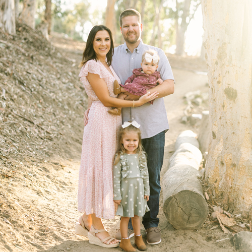 A family of four with two young children