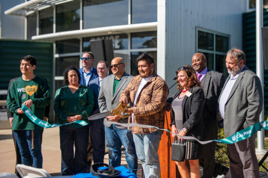 A ribbon cutting ceremony in front of the new Center for Military-Connected Students