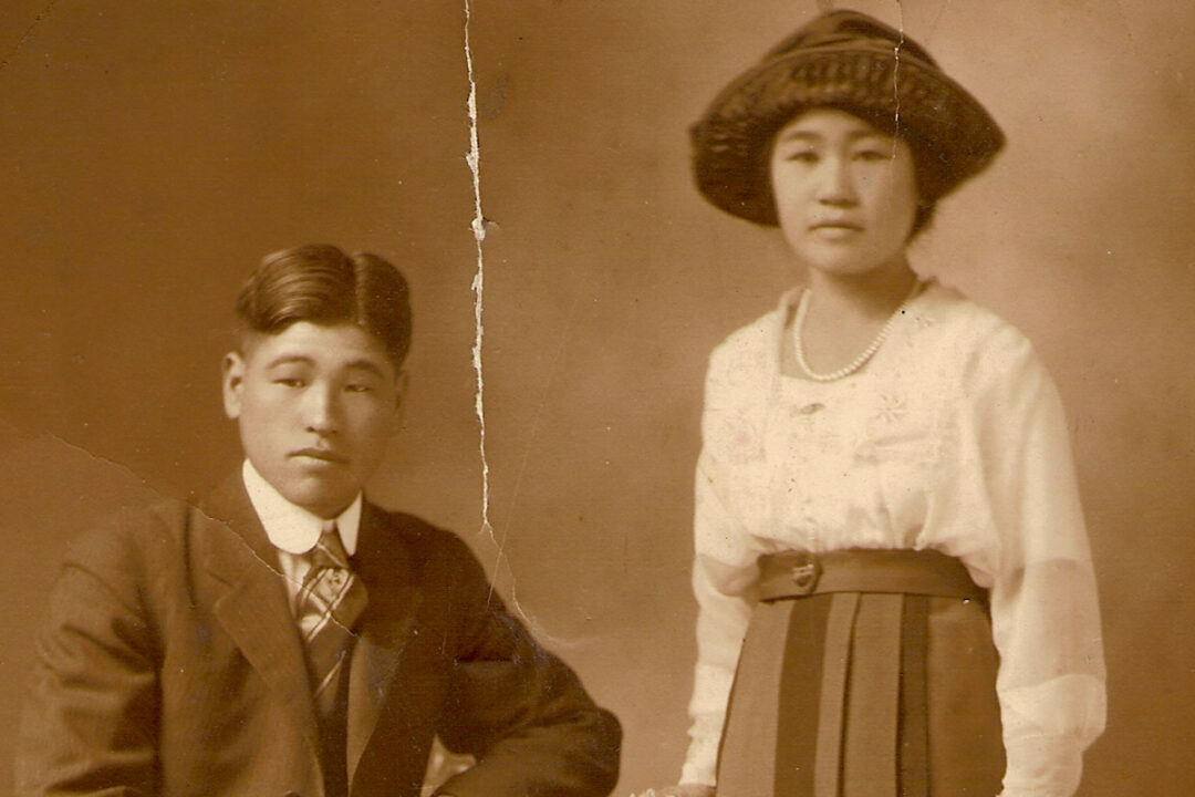 A sepia-toned photo of Japanese newlyweds