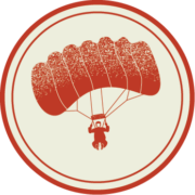 A circular icon illustrating a person parachuting in the air