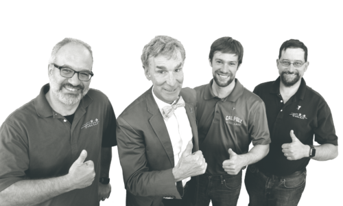 Bill Nye posing with a faculty member and students during the Lightsail Test