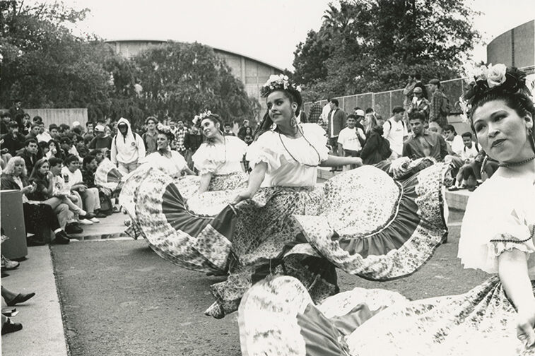 Ballet folklorico dancers performing in front of Mott Gym.