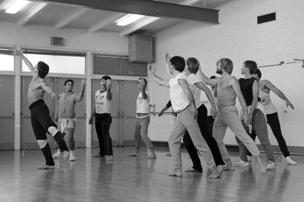 An archive image of male dancers rehearsing in a studio