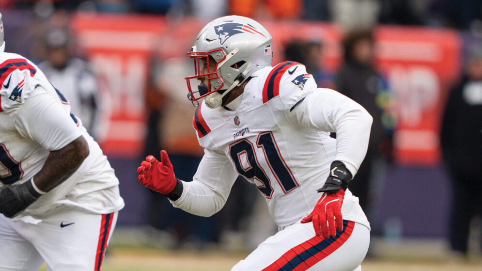 Patriots linebacker Elijah Ponder wears his uniform while playing on the field in an NFL game