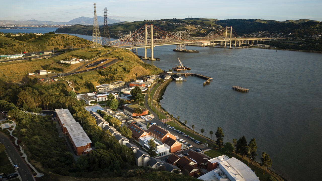 An aerial photo of Cal Poly's Solano Campus and a nearby bridge